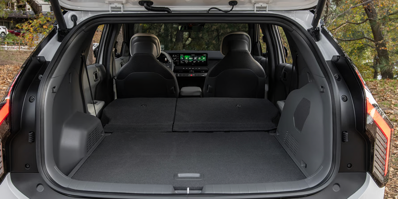 2027 Kia EV3 cargo area with rear seats folded flat